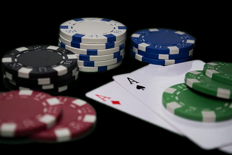 Casino poker chips sorted by colour